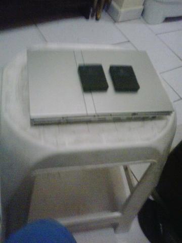 Playstation 2 cinza