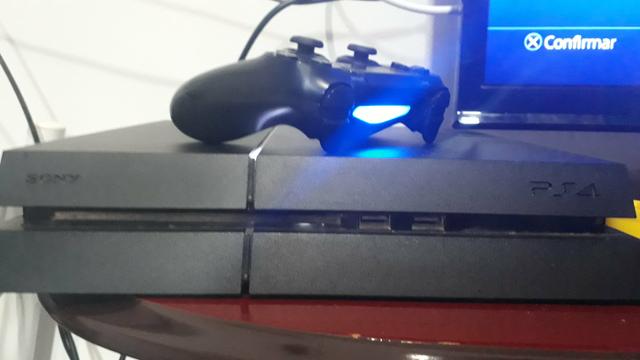 Ps4 semi novo com dois anos de garantia