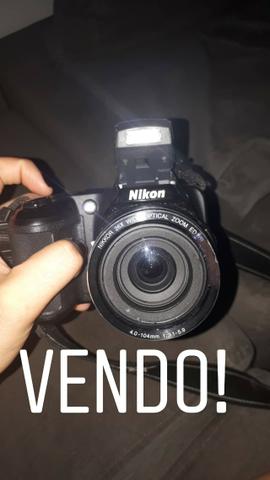 Câmera da Nikon semi-profissional