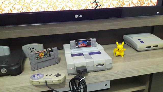 Super nintendo com 2 jogos