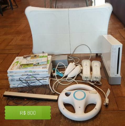 Wii com plataforma Wii Fit, volante e jogos