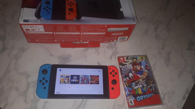 Nintendo Switch seminovo completo + Jogo Mario Odyssey e