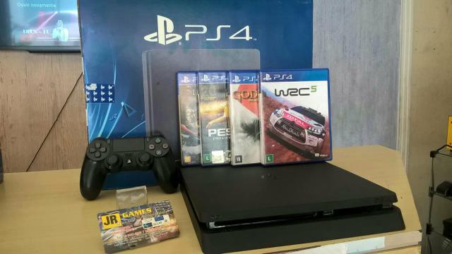 PlayStation 4 + jogo e garantia