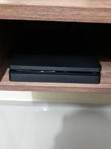 Vendo ps4 com pouquíssimo uso