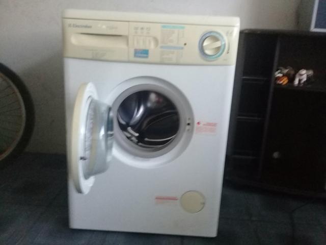 Máquina de lavar roupa.
