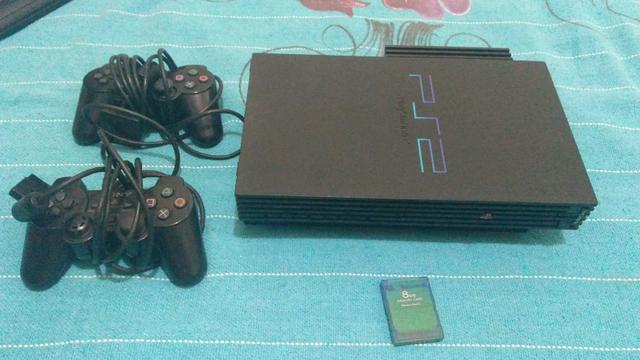 Playstation 2. Fat, versão original com modem.