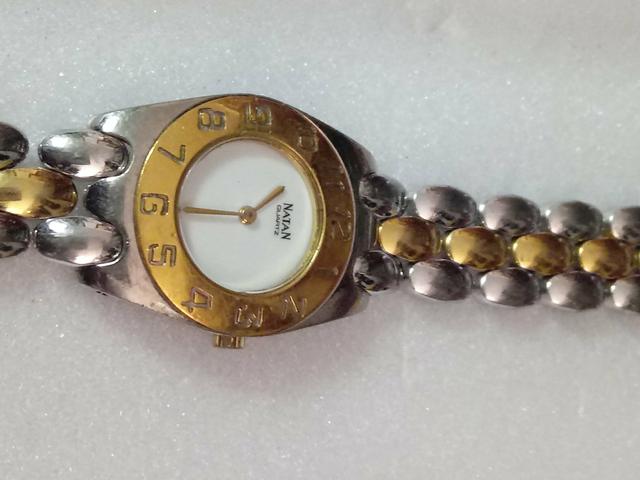 Relógio marca Natan feminino em aço e ouro quartsz