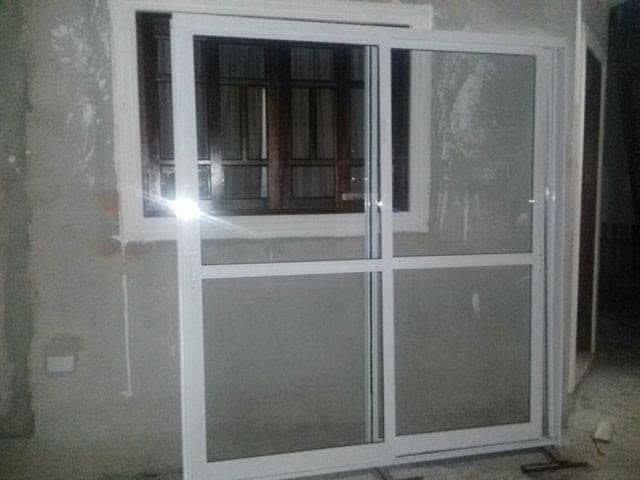 Porta de correr vidro laminado 850$