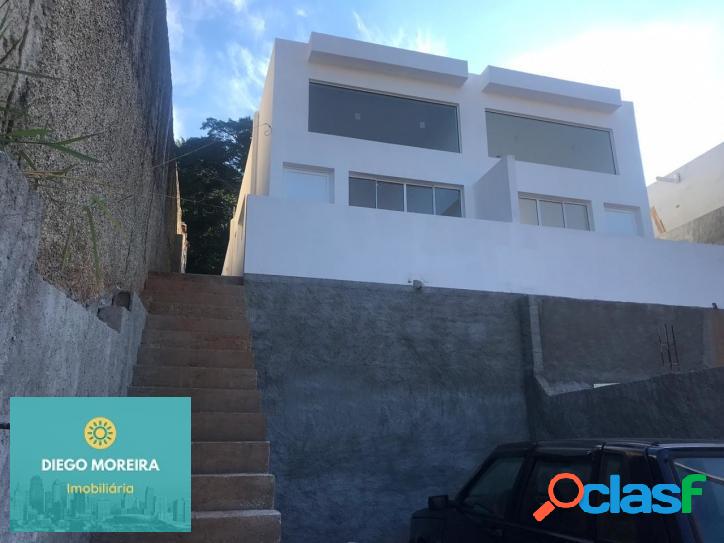 Casa em Terra Preta boa localização, 2 minutos da rodovia.