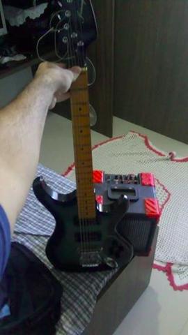 Guitarra com amplificador