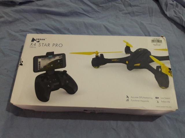 Troco drone hubsan com GPS, em celular. pra vender logo