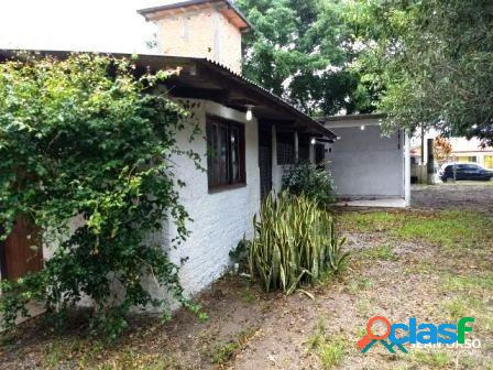 Terreno com 2 casas e galpão