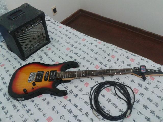 Guitarra + cubo + cabo + afinador digital