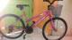 Bicicleta rosa femenina