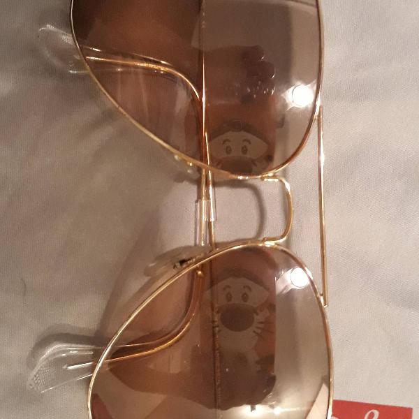 culos ray-ban dourado com lente degrade marrom