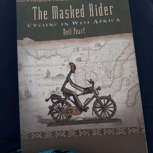 livro "the masked rider" por neal peart da banda rush