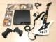 PlayStation 3 Slim + 2 controles + 6 jogos + guitarra