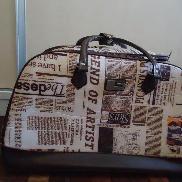 mala sacola de viagem de rodinhas estampada usada