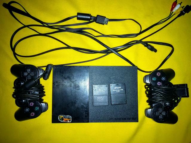 Vendo Playstation 2 completinho