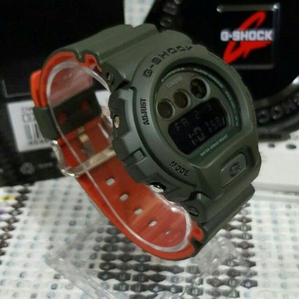 relógio casio g shock dw-6900lu-3dr verde laranja bicolor