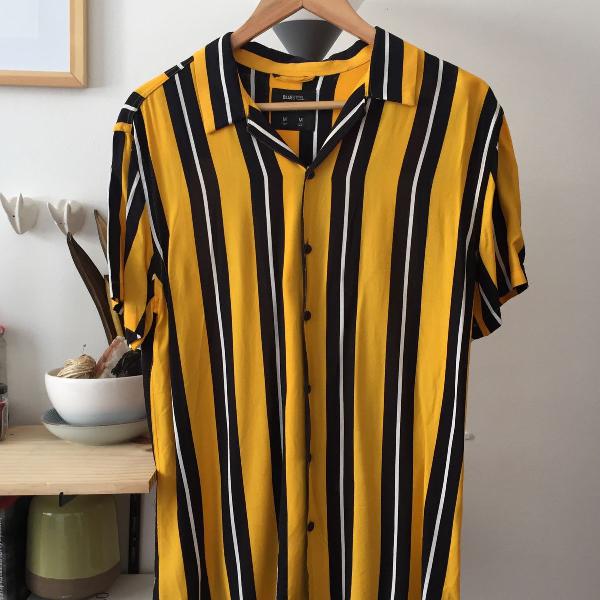 camisa listras pretas e amarelas