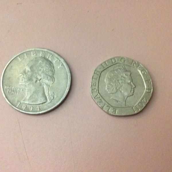 2 moedas quarter dollar 1994 e twenty pence 2011 r$53