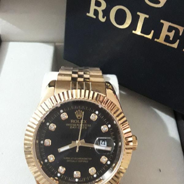 relógio feminino Rolex Just date dourado fundo preto