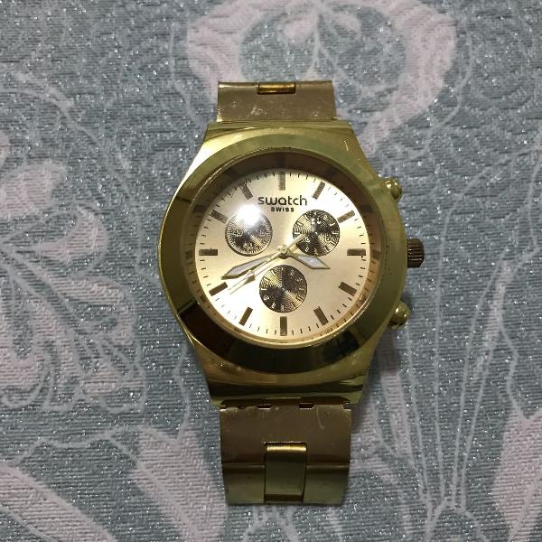 relógio swatch dourado