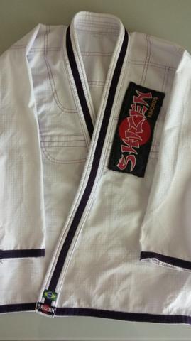 Kimono Jui Jidsu Feminino A1 Branco com detalhes roxos