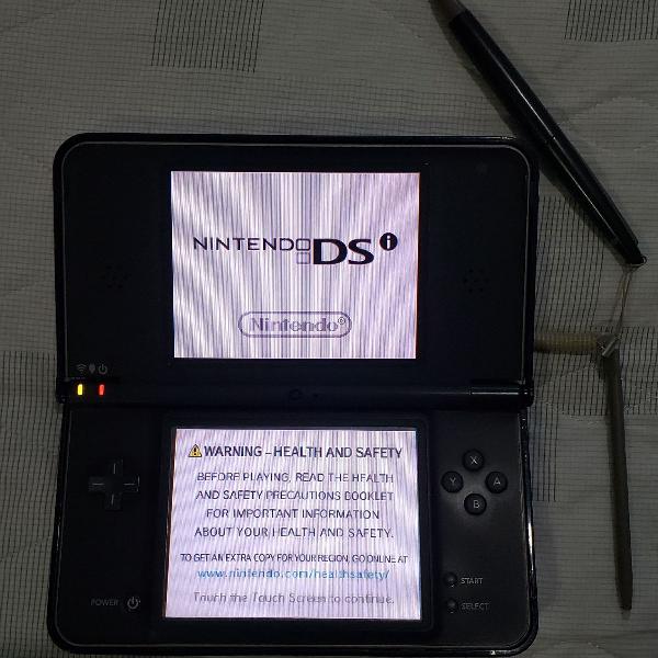 Nintendo DSi XL completo na caixa + case metálica
