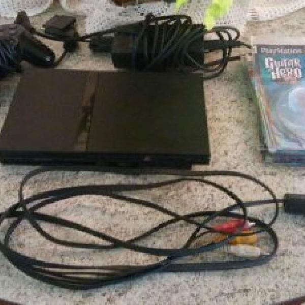 Playstation 2 + 1 controle + cabos + diversos jogos.