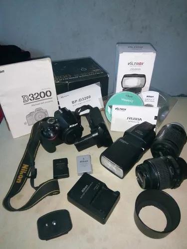 Nikon D3200+lentes 18 55 E 55 200+grip+2baterias+flash+tripe