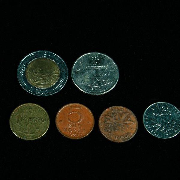 coleção com 6 moedas de países e épocas distintas
