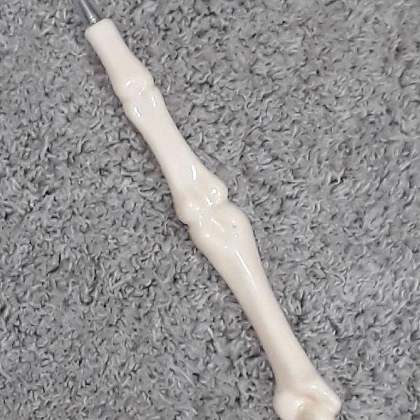 Caneta formato osso
