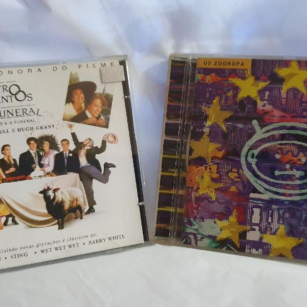 cds do U2 e Trilha sonora filme Quatro Casamentos e um