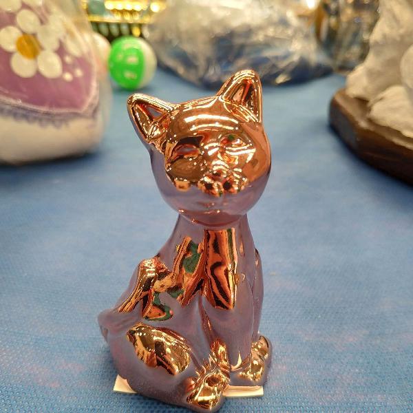 Gato de porcelana cobre