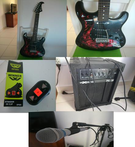 guitarra EAGLE, com cubo, afinador, microfone e pedestal