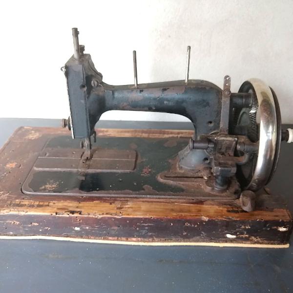 máquina de costura a mão