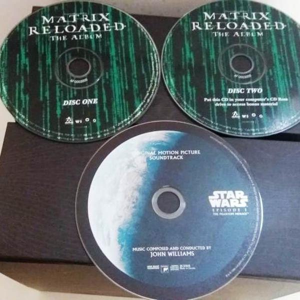 lote de cds filmes star wars e matrix com as musicas