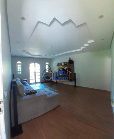 Casa com 3 dormitórios para alugar, 120 m² por R$