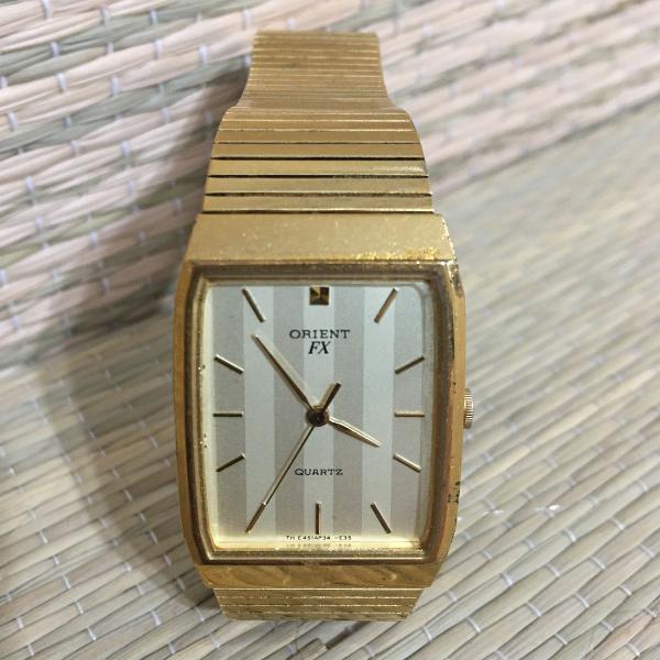 relógio orient fx dourado anos 70
