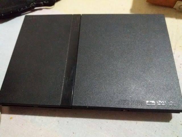 Playstation 2 com defeito