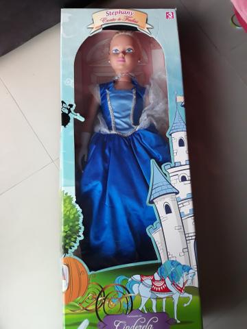 Bonecas princesas e maleta dentinho