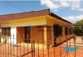 Casa com 3 dormitÃ³rios Ã venda, 176 mÂ² por R$ 450.000