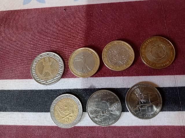 Euros pesos e quarter dollar
