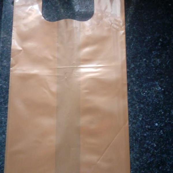 sacola plastica - dourada