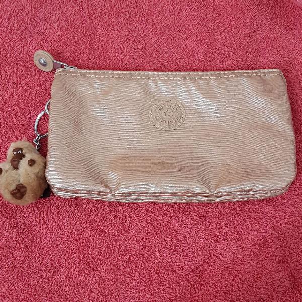nécessaire ou carteira kipling. cor: gold rose