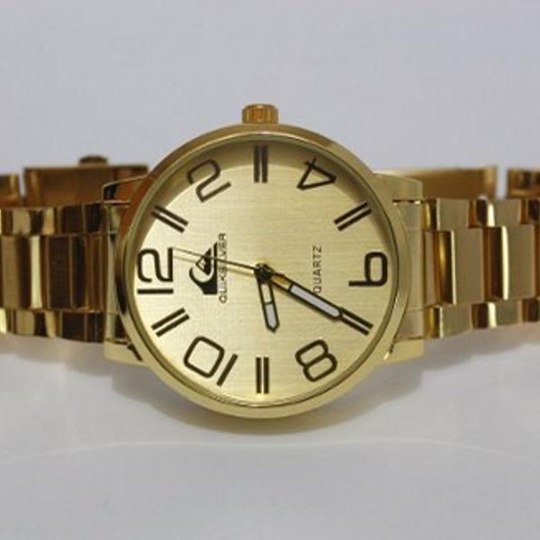 relogio quiksilver dourado