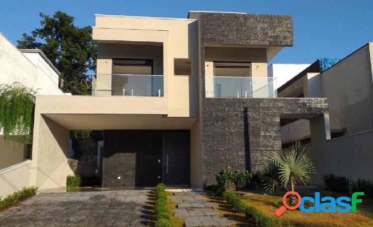 Casa com 5 dormitórios, 302 m² por R$ 2.600.000 - Riviera