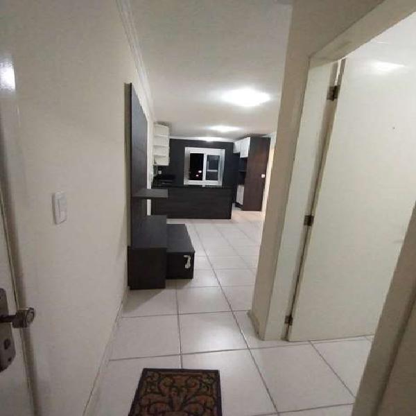 Vendo apartamento semi mobiliado com 2 dormitórios e 2